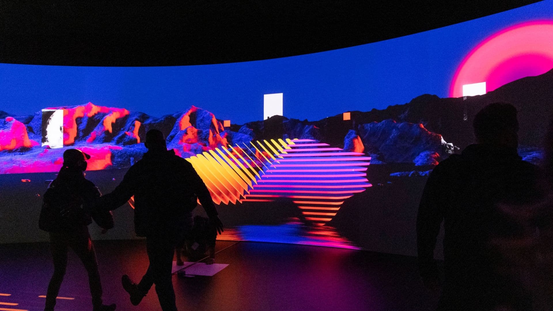 BMW Dimensions of Real — silhouettes walk through neon light zones, CES Las Vegas